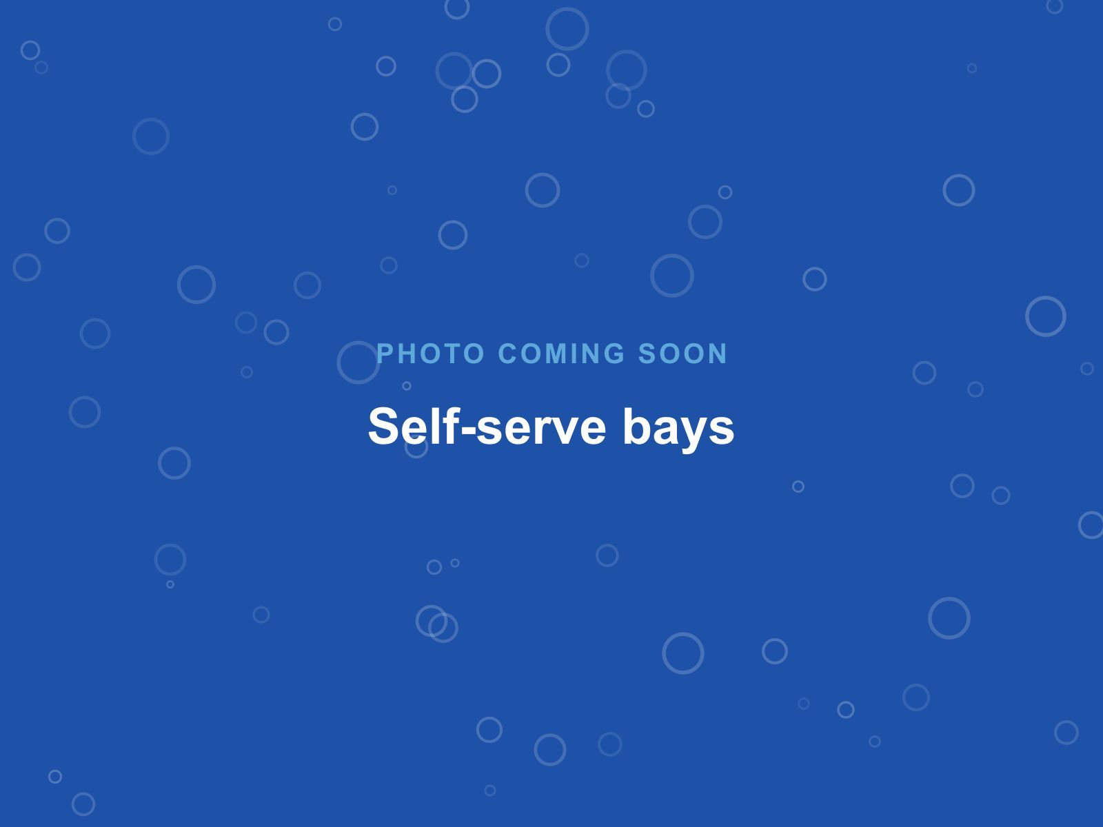 The two drive-through self-serve bays